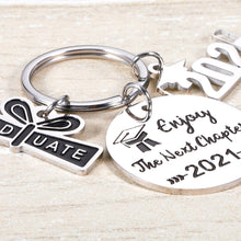 Load image into Gallery viewer, Graduation Keychain Gifts for Class 2021 Boys Girls Graduation Key Chain from High School College Gift Enjoy The Next Chapter Key Ring for Him Her Sons Daughters Students Graduates from Mom Dad
